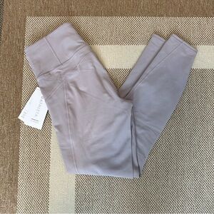 NWT Athleta Rainer Tight, size M, "Tinsel Purple" (light lavender)